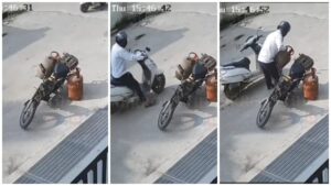 Cylinder Thief: Fearless theft in front of the camera...! Gas cylinder stolen from in front of the house in broad daylight... Shocking video goes viral