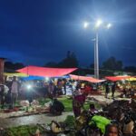 Adani Foundation's green initiative brings life back to villages...! Solar lights illuminate markets and streets.