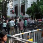 Bengal Elections: Violent Clash Between TMC and BJP Workers Outside Election Official's Office...! Vehicles Vandalized... Tensions Escalate Following Suvendu Adhikari's Visit.