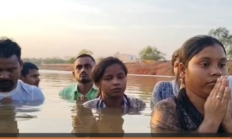 D.Ed Candidates: Aspirants wade into water up to their necks...! Standing in the water, they raise a cry for justice... Demanding recruitment for 2,300 posts... Watch VIDEO here.