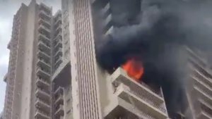 Noida Sector Fire: High-rise flat turns into a fireball... Chaos erupts in Noida society.