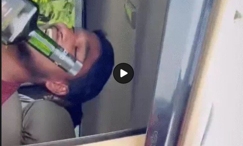 Korba Viral Video: Dangerous stunt for a 'Reel' at the Korba helipad! Young man leans out of a moving Bolero holding a liquor bottle; driver arrested.
