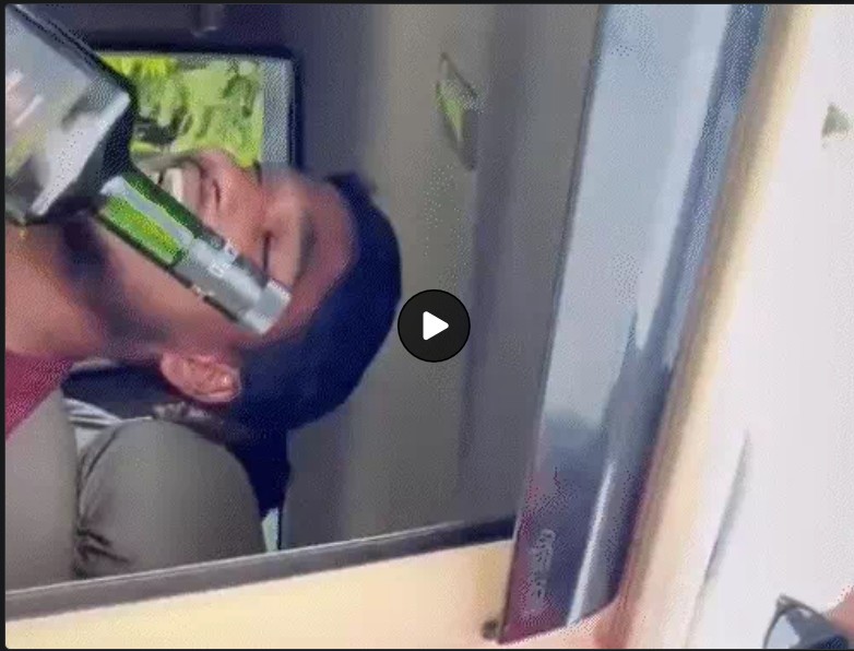 Korba Viral Video: Dangerous stunt for a 'Reel' at the Korba helipad! Young man leans out of a moving Bolero holding a liquor bottle; driver arrested.